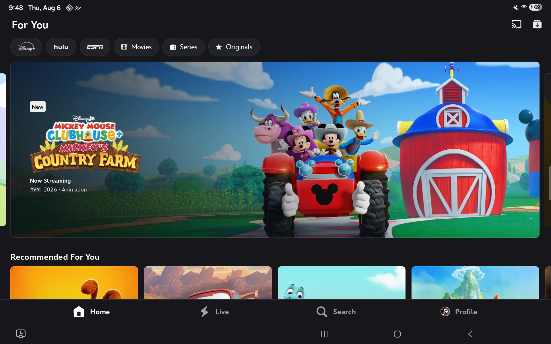 A rating-restricted kids profile on a streaming app: kid-safe, but endless rows — with Hulu and ESPN hubs one tap away